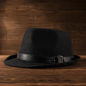 Classic black wool fedora hat with leather band and silver buckle on white background