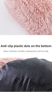 Detail of pink plush pet bed featuring a non-slip waterproof and wear-resistant bottom