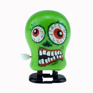 Giocattolo a molla mostro verde per Halloween con occhi rossi e funzione camminata
