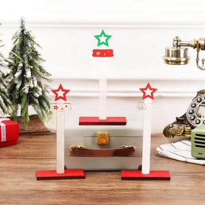 Three-piece wooden DIY Christmas tree tabletop decorations with festive holiday engravings