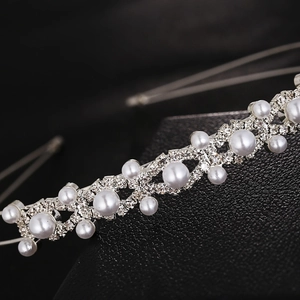 Elegant silver multilayer headband featuring white pearls and sparkling rhinestones