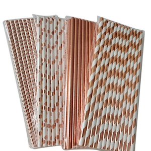 Rose gold paper straws with assorted chevron, dot, and stripe patterns for party decor