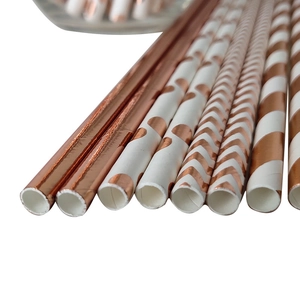 Rose gold paper straws with heart, stripe, and wave patterns for party beverage decoration