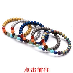Detail of natural stone bracelets with stainless steel beads in various colors