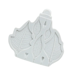 Detailed view of silicone mold featuring intricate leaf vein patterns for cake decorating