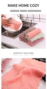 Close-up of thick coral velvet kitchen towel with wavy edges and absorbent fiber texture