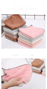 Close-up of microfiber pineapple texture dishcloths showing water absorption on plates