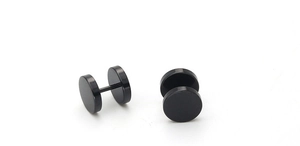 Close-up of matte black stainless steel barbell stud earrings with round flat ends