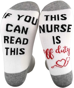 Detail of cotton socks with IF YOU CAN READ THIS NURSE IS OFF DUTY print and stethoscope