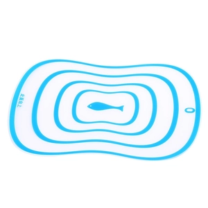 Frosted white and blue flexible plastic cutting board with fish pattern and hanging hole