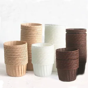 Greaseproof cupcake liners in white, brown, and kraft colors for professional muffin baking
