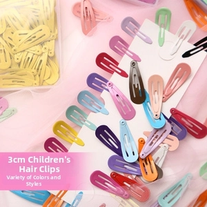 Close-up of 3cm colorful drip oil teardrop hair clips arranged on white card board
