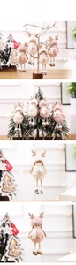 Detail of plush Christmas reindeer ornaments with long legs and soft fur in cozy forest style