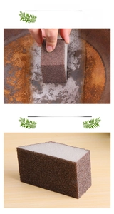 Macro view of dual-layer emery sponge showing brown abrasive texture and rust removal effect