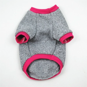 Detailed view of gray pet hoodie with pink ribbed cuffs on a clean white background