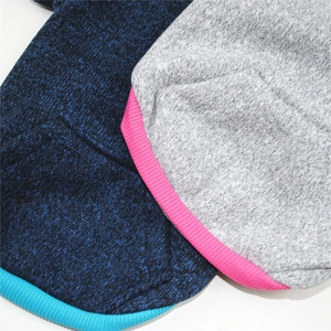 Close-up of contrast ribbing and soft fleece texture on navy and grey pet hoodies