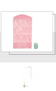 Detailed view of pink hanging organizer with 16 transparent pockets and reinforced seams