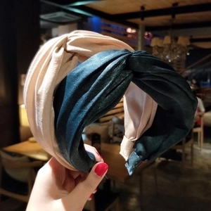 Cross-knot fabric headband in beige and dark green colors with a wide-edge texture design