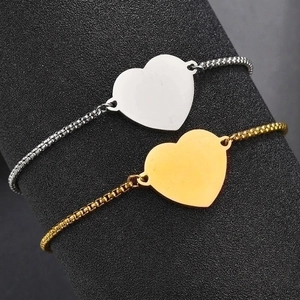 Polished stainless steel heart pendant bracelet with adjustable box chain in gold and silver