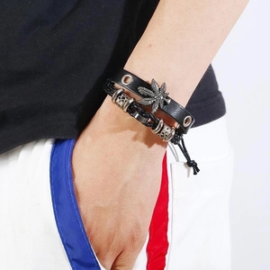 Men's punk leather bracelet set featuring alloy maple leaf charm and braided cord on wrist