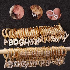 Gold and silver cubic zirconia hoop earrings with hanging A-Z initial letter pendants