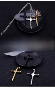 Detailed view of rope-textured cross pendants in black, gold, and silver stainless steel