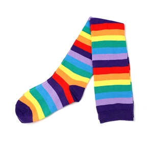 Detailed view of rainbow striped long socks with soft colorful fabric patterns
