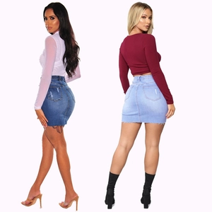 Distressed denim mini skirt for women in light and dark blue with ripped hem and pocket details