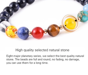 Macro detail of natural stone beads representing eight planets in the galaxy bracelet