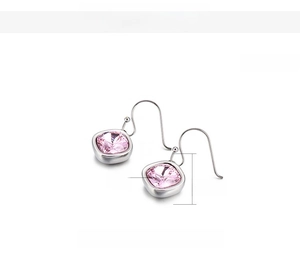 Detail view of 13mm square pink faceted zircon earrings with stainless steel hooks