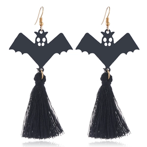 Close-up of Halloween bat tassel earrings featuring black wings and long silk fringes