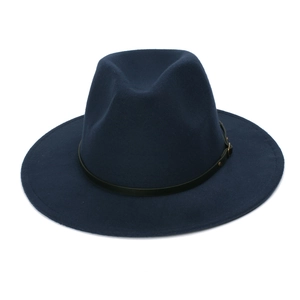 Detailed close-up of a navy wool fedora hat featuring a slim black leather belt and buckle