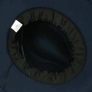 Inside view of vintage navy felt fedora showing size 57 label and sweatband detail
