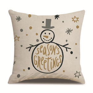 Detail of linen Christmas pillowcase showing snowman graphics with season's greetings text