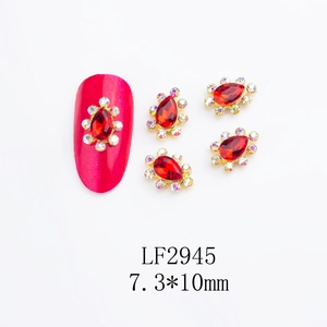 Macro view of 7.3x10mm red teardrop rhinestone with AB crystals and gold metal base