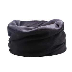 Detail of warm black fleece beanie featuring soft grey faux fur lining for winter comfort
