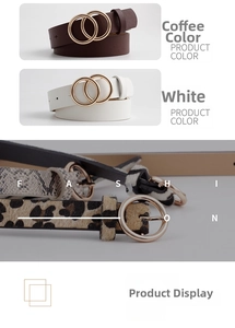 Close-up of double golden ring buckles on belts with animal patterns and solid colors