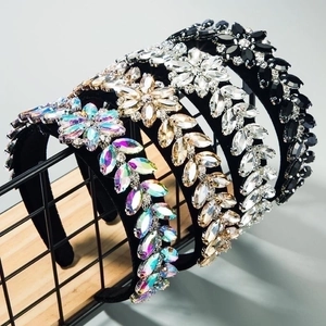 Detail of four baroque headbands with hand-set rhinestones and floral patterns