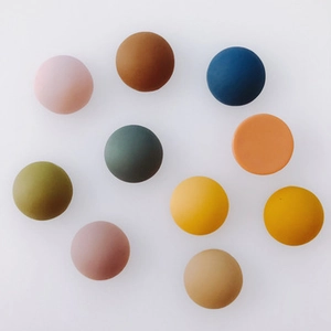 Macro shot of colorful matte acrylic beads for DIY jewelry and accessory making
