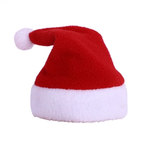 Classic red Christmas pet hat with white plush pompom and trim for cats and dogs
