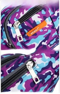 Detail showing high-quality stitching, SPORT rubber logo, and silver metal zipper on camo bag