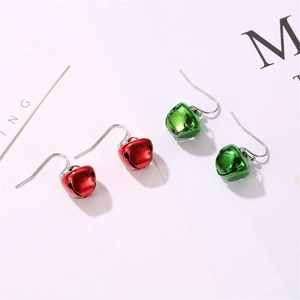 Close-up of red and green bell-shaped earrings for Christmas jewelry gift set