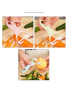 Ceramic fruit peeler set showing pink, green, and blue peelers on a wooden board