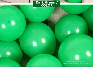 Close-up of glossy dark green latex balloons with smooth reflective finish