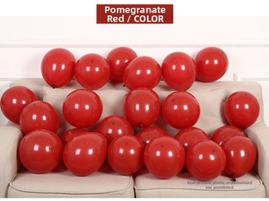 Close-up of vibrant 10-inch pomegranate red matte latex balloons for party decoration