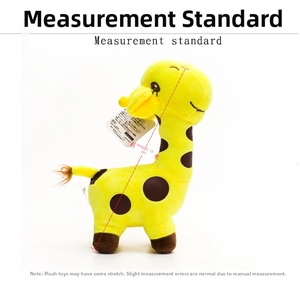 Detailed view of yellow giraffe plush toy measuring 18cm with spotted patterns
