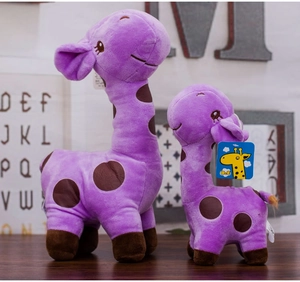 Detail showing two purple plush giraffes with realistic spots and soft texture