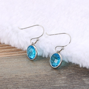 Fashionable titanium steel earrings with oval blue faceted gemstone pendants for women