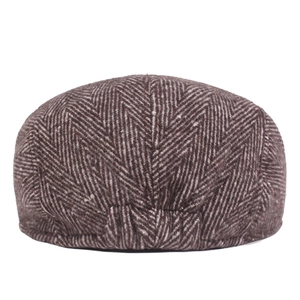 Detailed back view of herringbone pattern wool flat cap in brown and white fabric