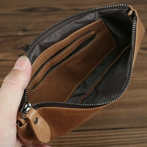 Detailed interior of a brown crazy horse leather wallet showing card slots and compartments